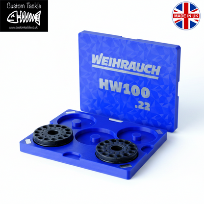 A blue Weihrauch HW100 .22 custom Magazine storage case shown open on a white background, with twomagx placed inside.