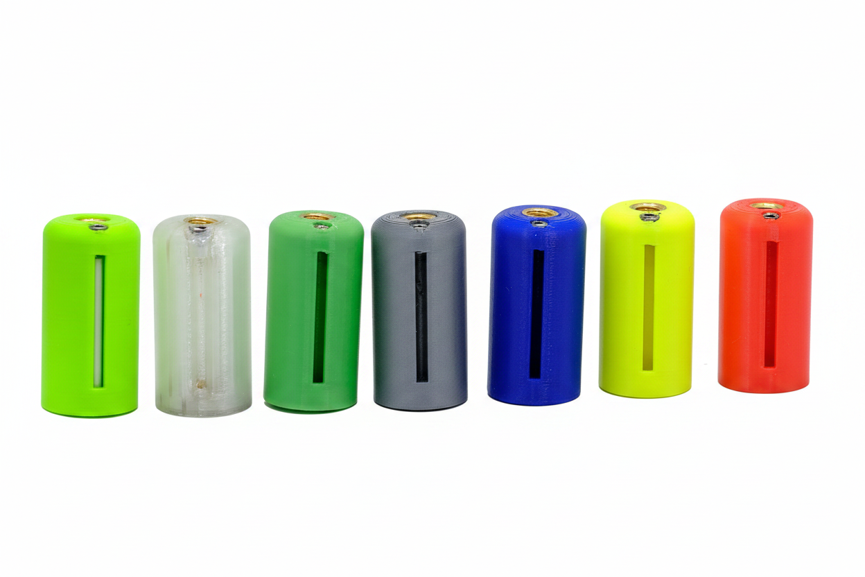 Eight colourful fishing bobbins on bright white background